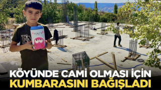 Köyünde cami olması için kumbarasını bağışladı